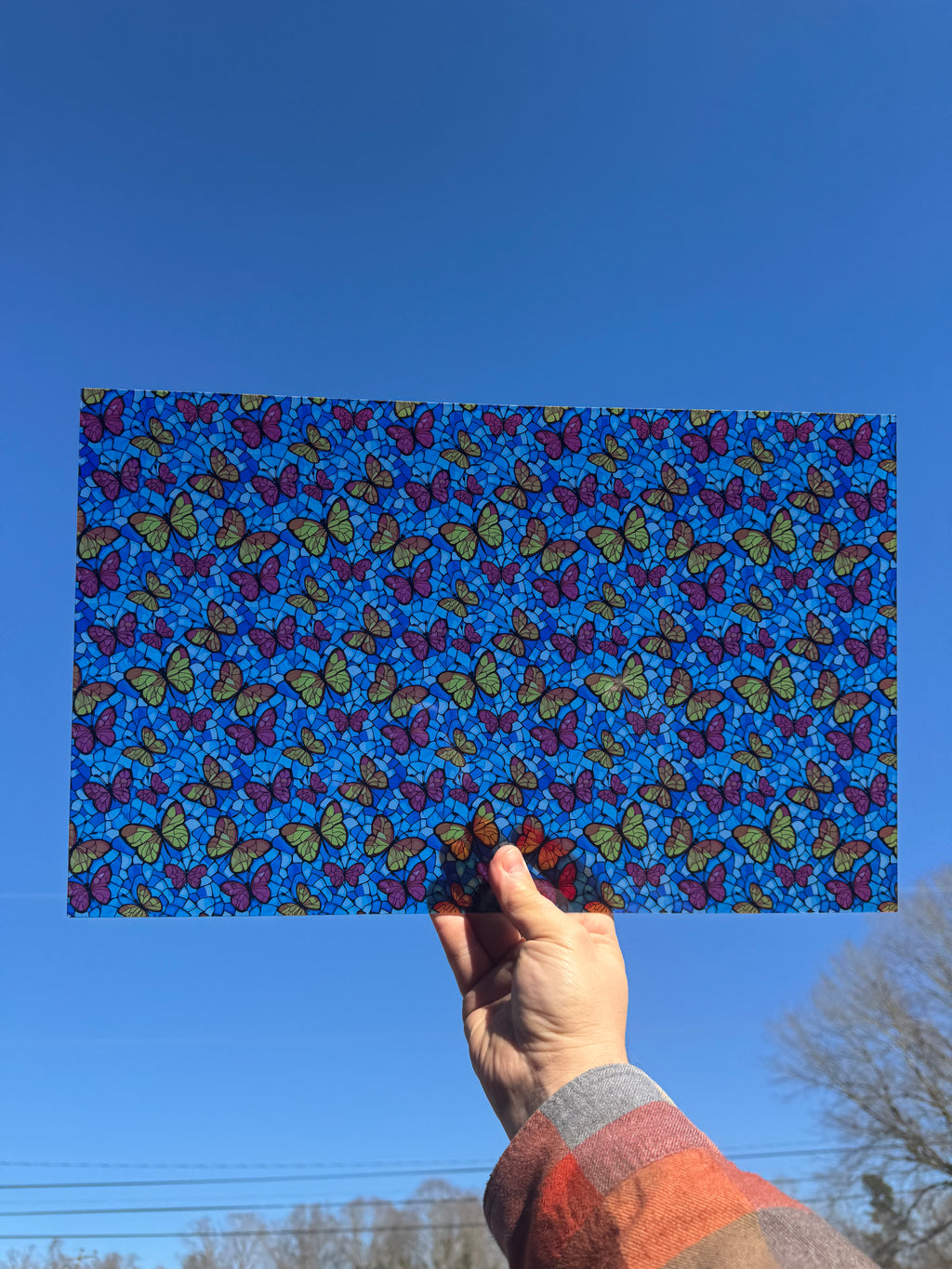 PatternPly® Transparent Butterfly Sky Stained Glass sheet showing the pattern