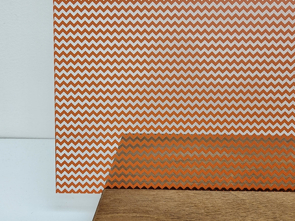 PatternPly® Scattered Micro School Chevron ORANGE sheet showing the pattern