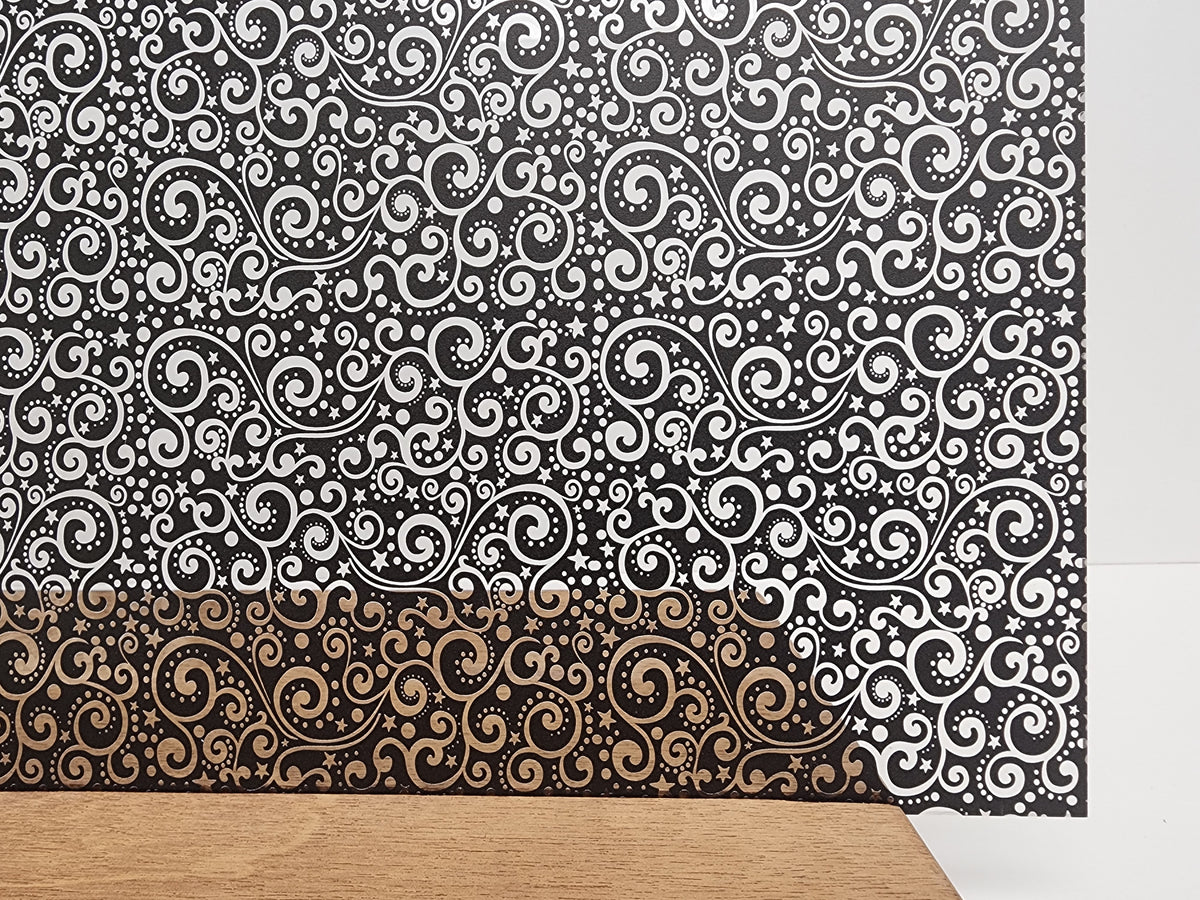 PatternPly® Scattered Christmas Scrolls BLACK sheet showing the pattern