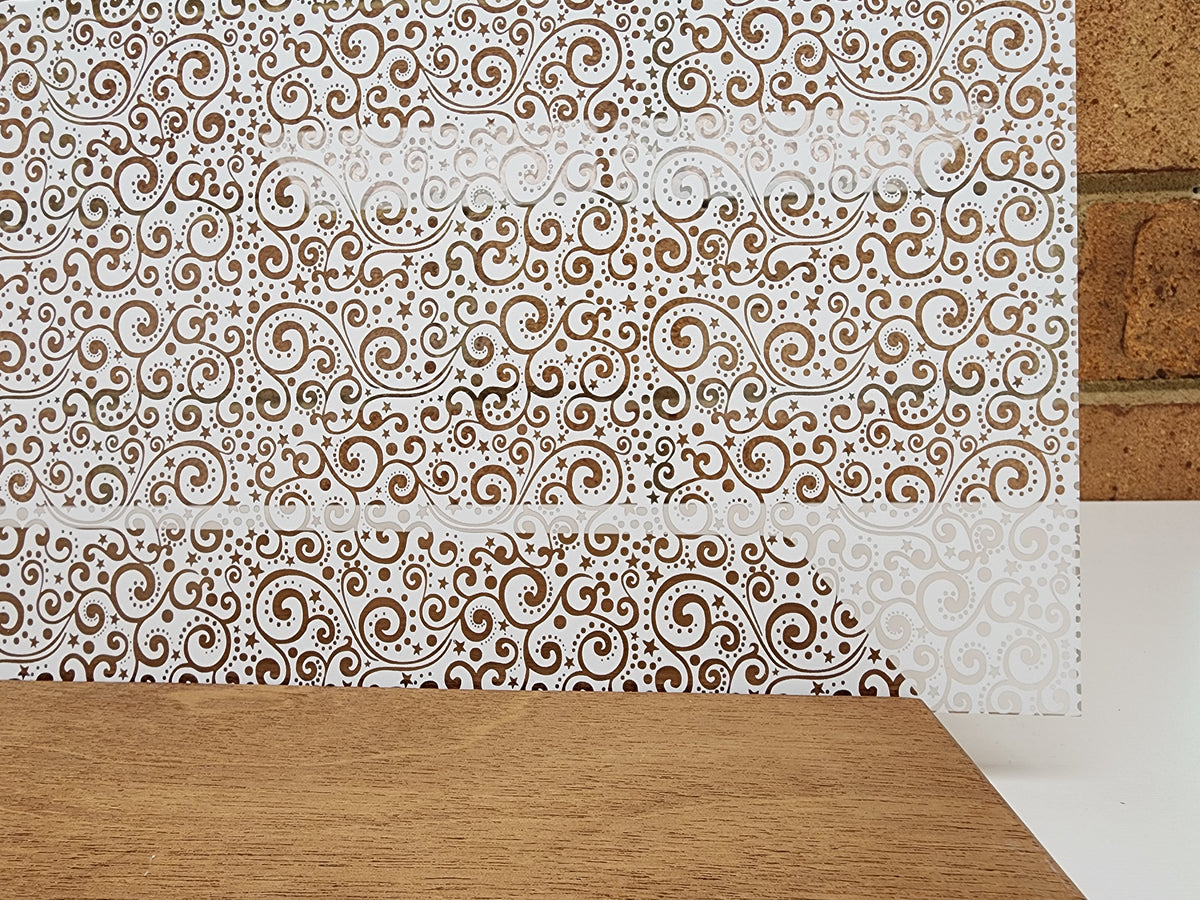 PatternPly® Scattered Christmas Scrolls WHITE sheet showing the pattern