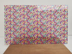 PatternPly® Scattered Colorful Brushstrokes sheet showing the pattern