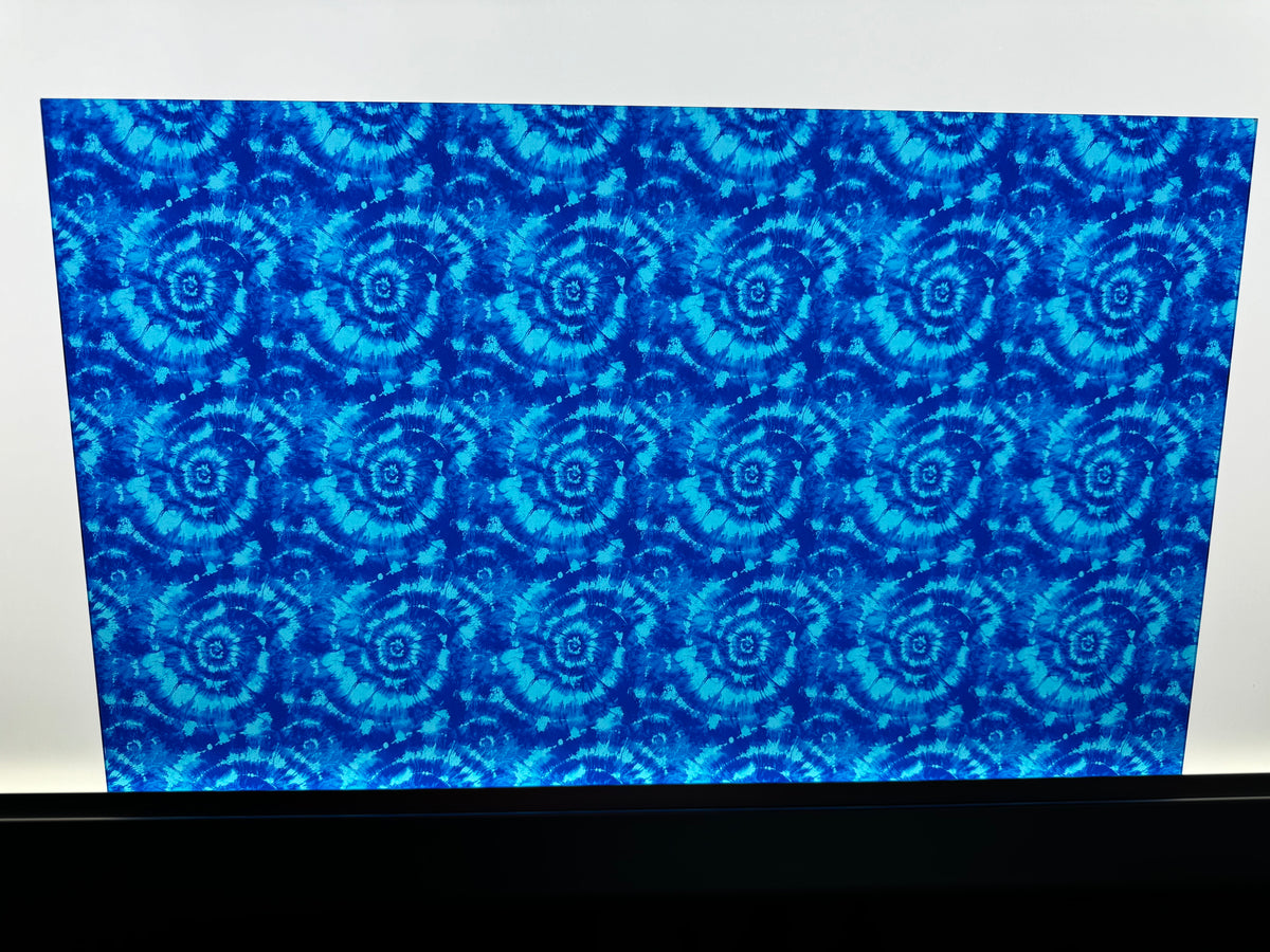 PatternPly® Transparent Light Blue and Dark Blue Tie Dye sheet showing the pattern