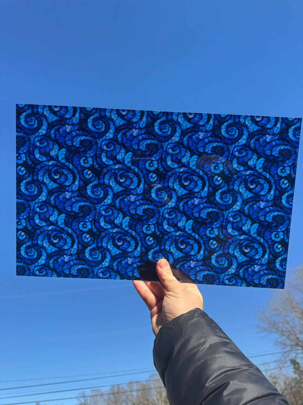 PatternPly® Transparent Swirling Stained Glass Waves sheet showing the pattern
