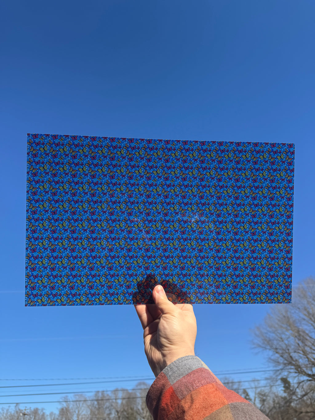 PatternPly® Transparent Micro Butterfly Sky Stained Glass sheet showing the pattern