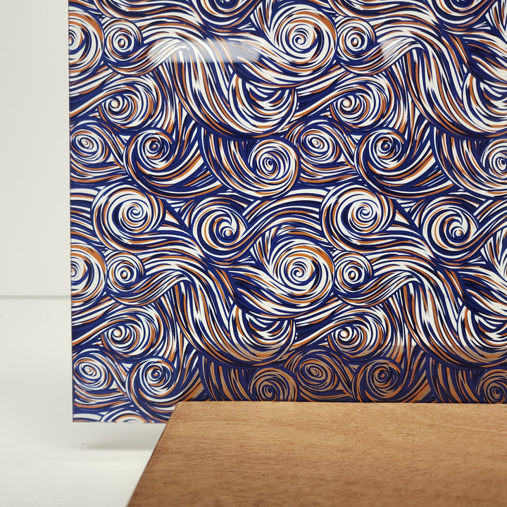 PatternPly® Scattered Dark Blue and Orange Swirls