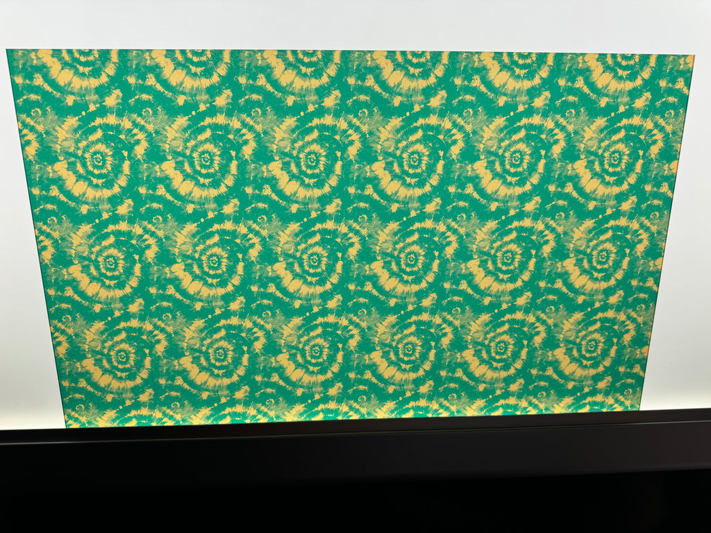 PatternPly® Transparent Teal and Bronze Tie Dye sheet showing the pattern