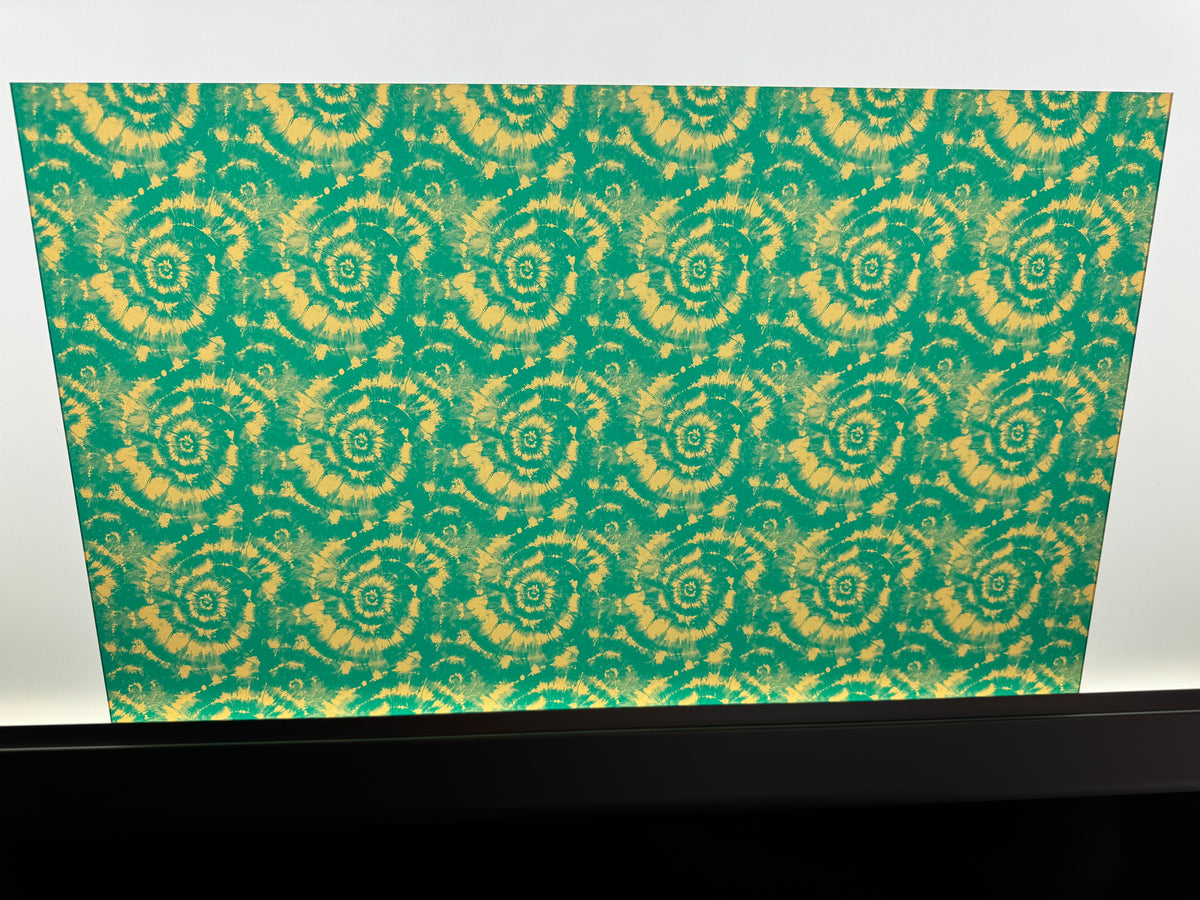 PatternPly® Transparent Teal and Bronze Tie Dye sheet showing the pattern