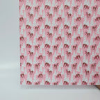 PatternPly® Full Coverage Fawn in the Snow Pink sheet showing the pattern