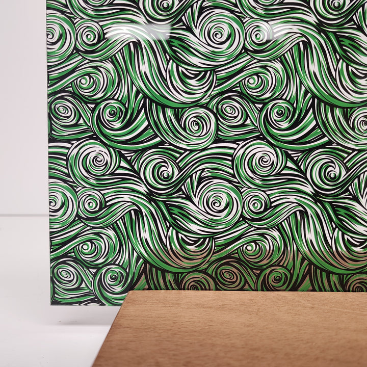 PatternPly® Scattered Green and Black Swirls