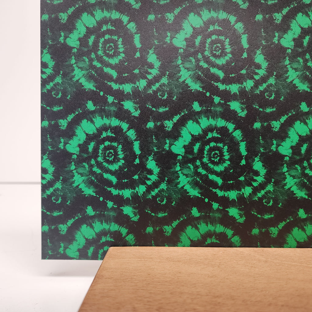 PatternPly® Full Coverage Green and Black Tie Dye sheet showing the pattern