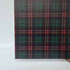 PatternPly® Full Coverage Green and Red Tartan Plaid sheet showing the pattern