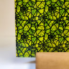 PatternPly® Full Coverage Green Stained Glass Spiderwebs sheet showing the pattern