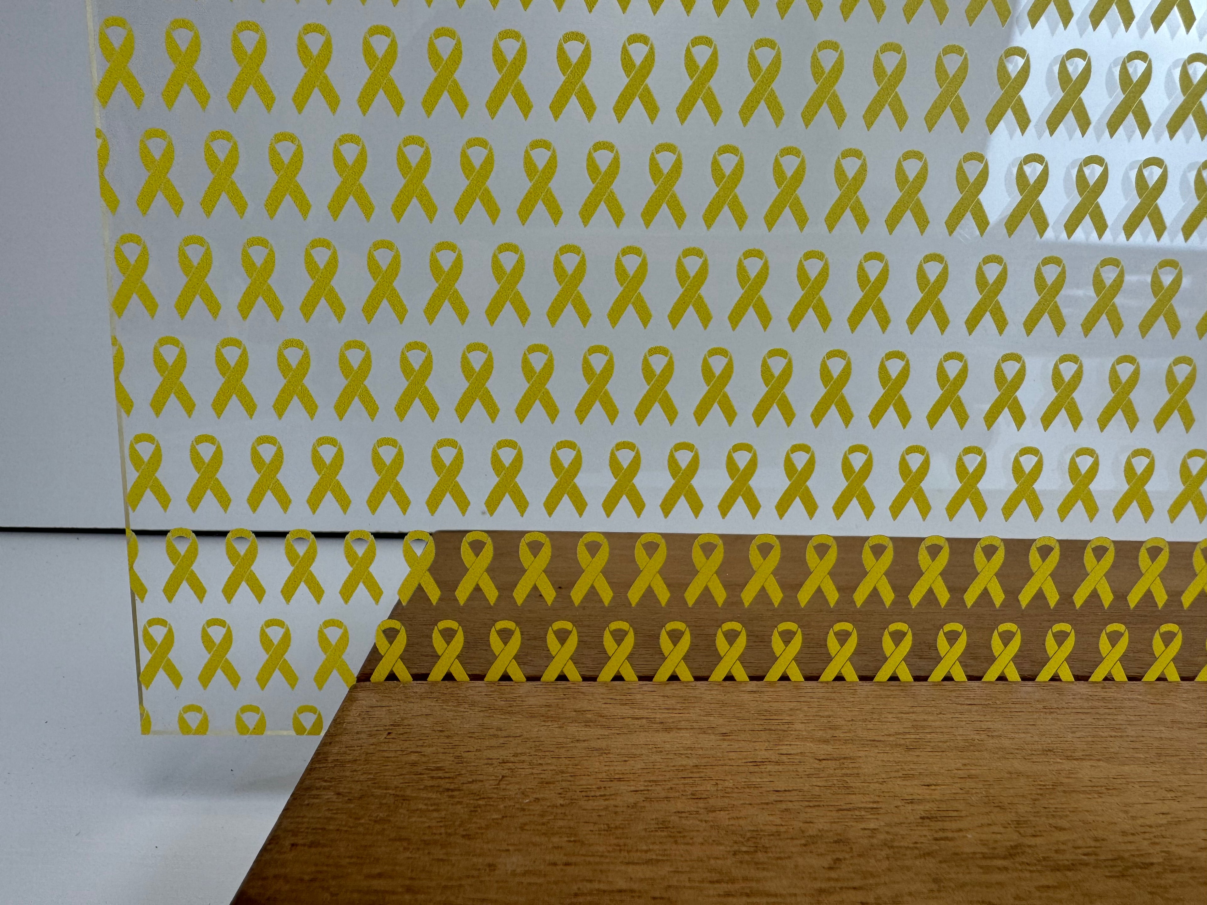 PatternPly® Scattered Yellow Ribbons sheet showing the pattern