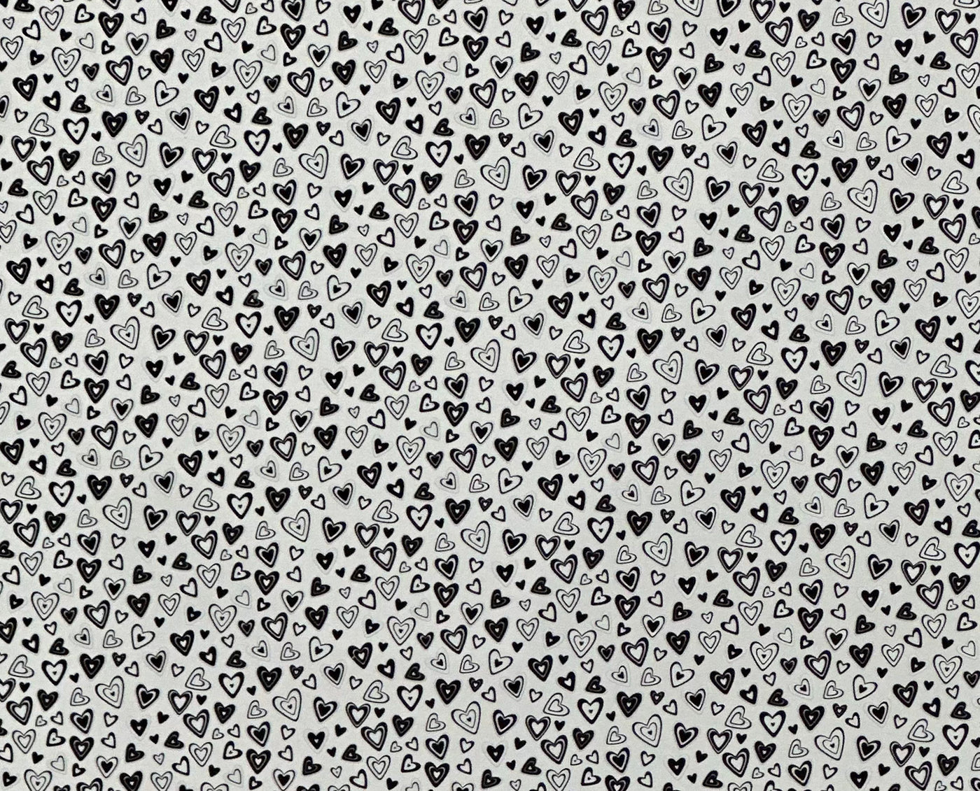 PatternPly® Scattered Micro Black and White Hearts