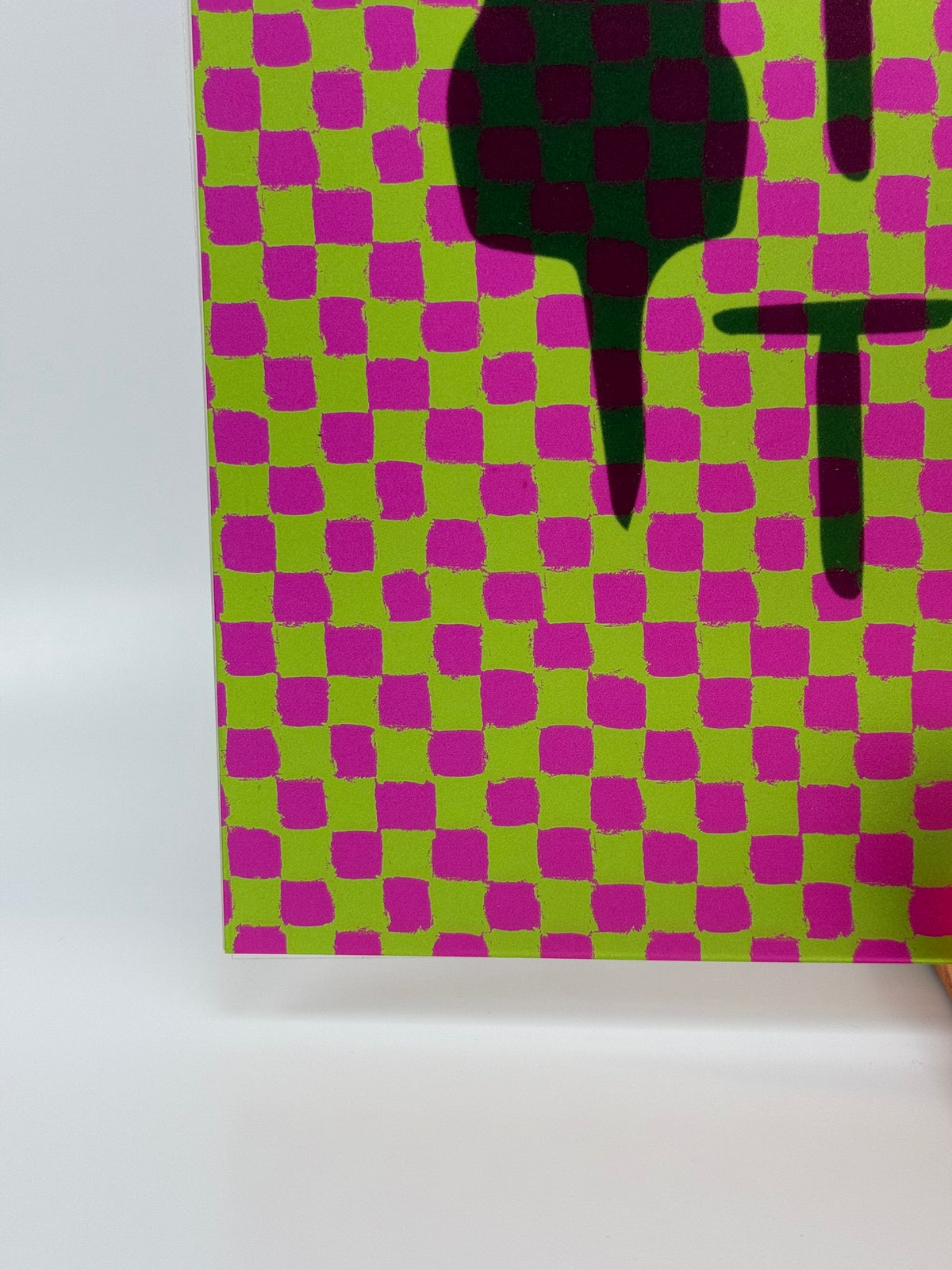PatternPly® Transparent Pink and Green Neon Checkered sheet showing the pattern