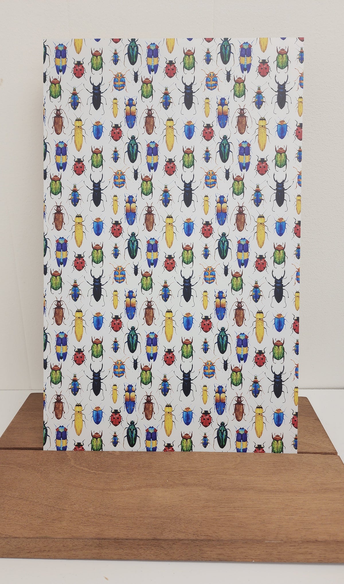 PatternPly® Full Coverage Large Beetles VERTICAL sheet showing the pattern