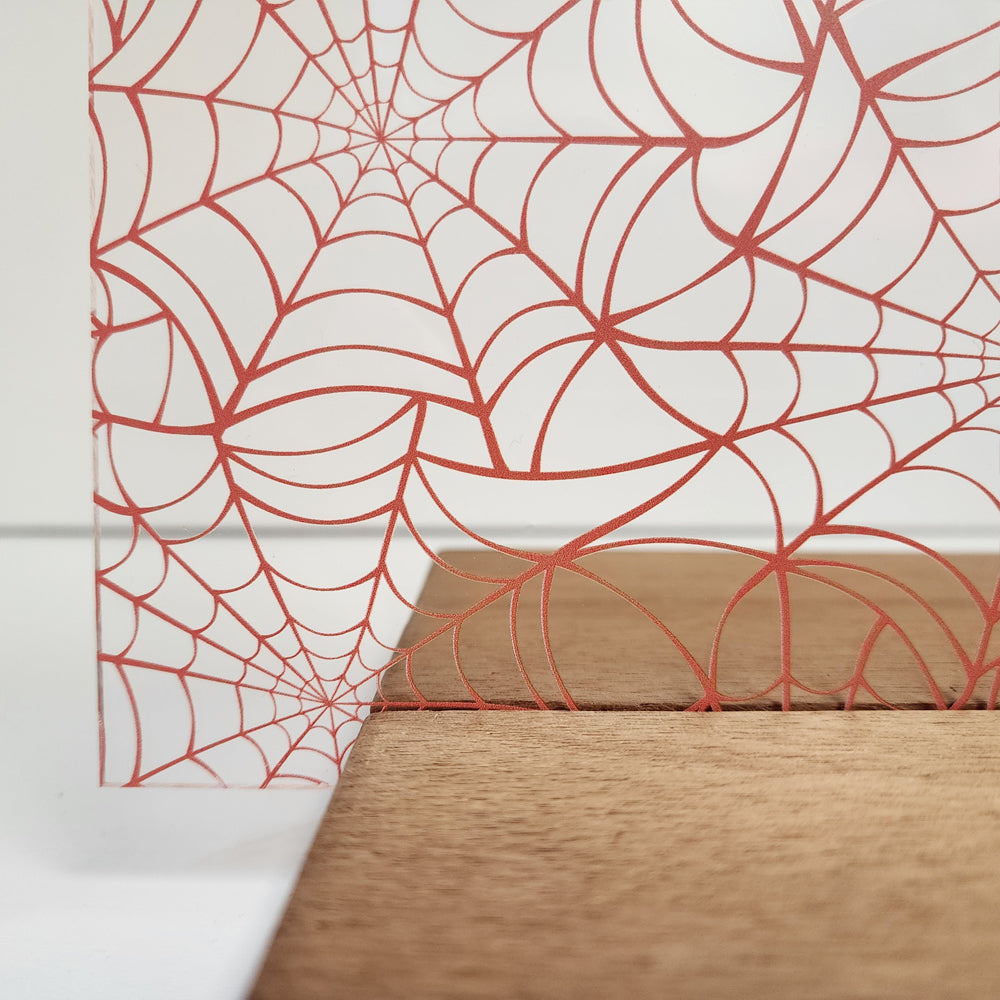 PatternPly® Scattered Vermilion Spiderwebs Large sheet showing the pattern