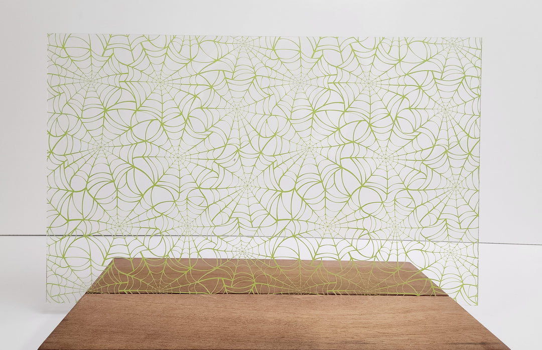 PatternPly® Scattered Green Spiderwebs Large