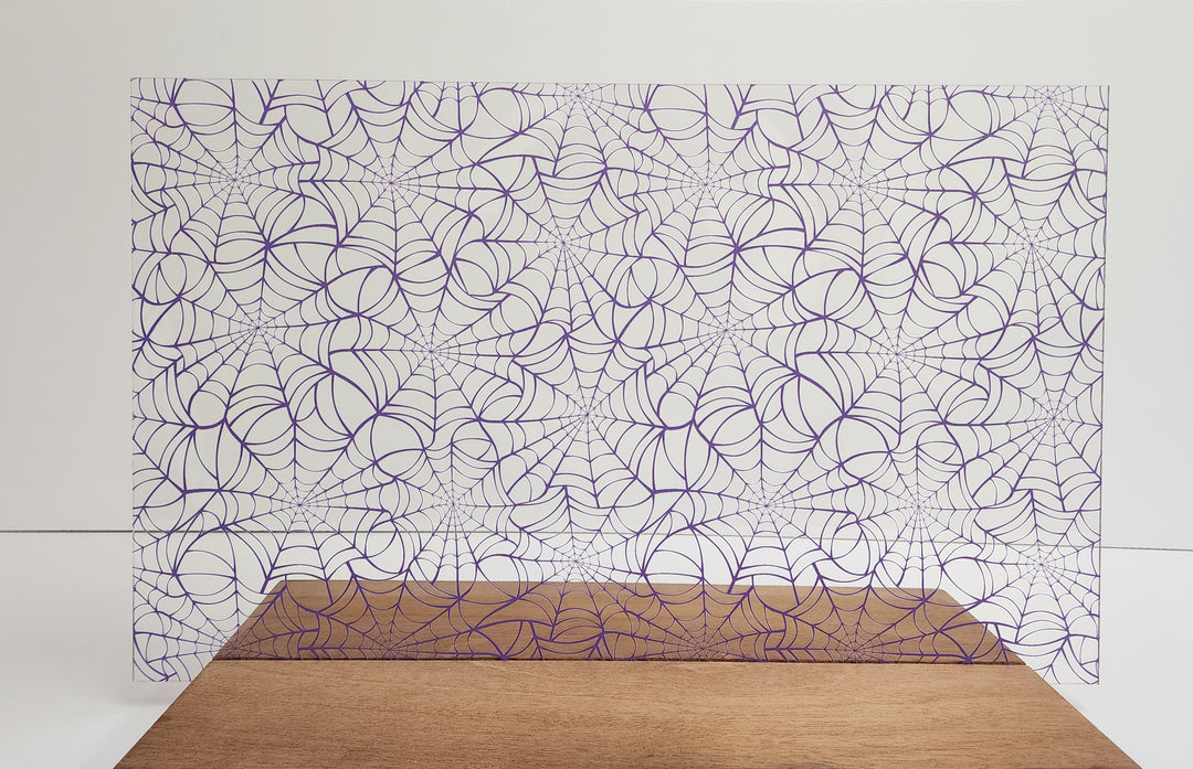 PatternPly® Scattered Purple Spiderwebs Large