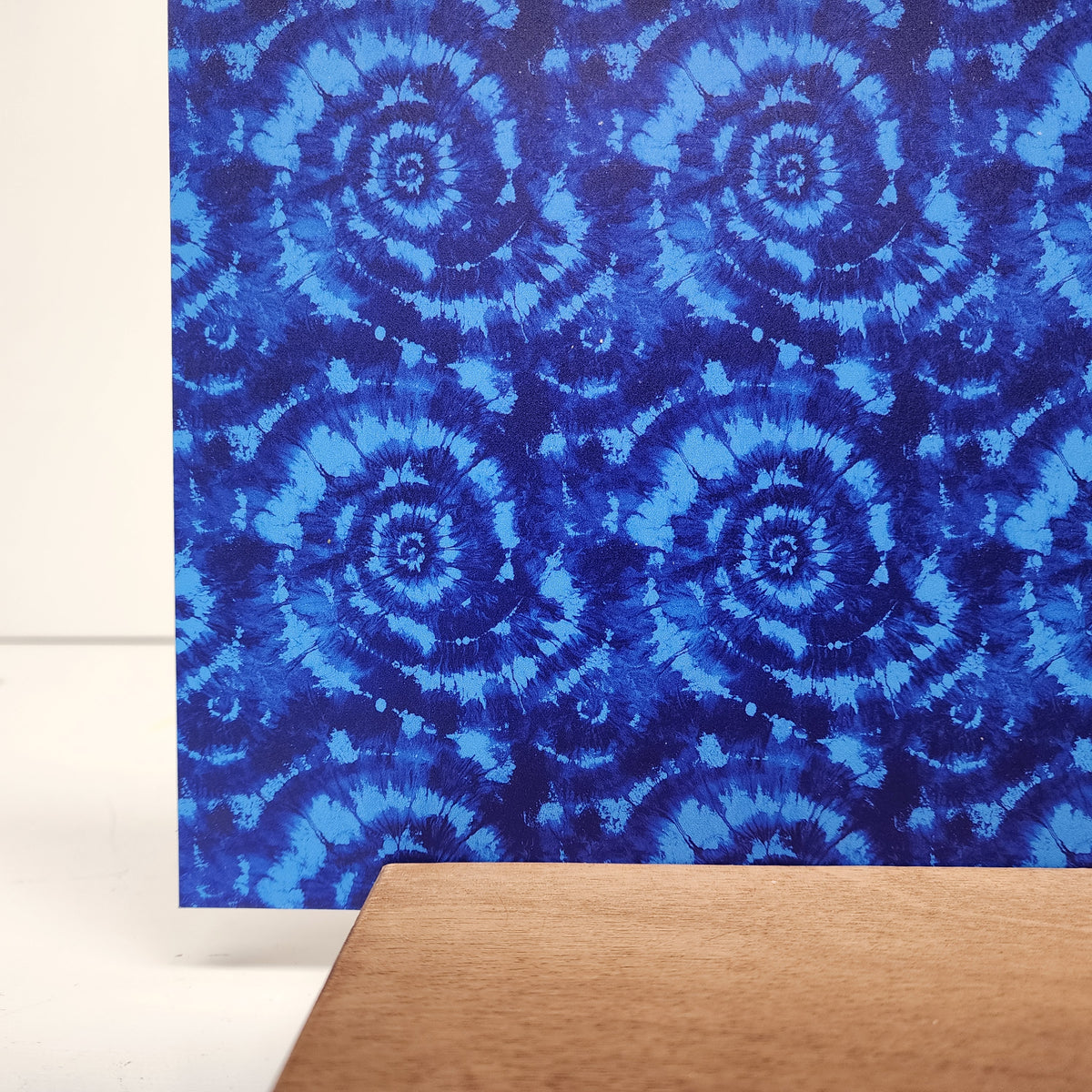 PatternPly® Full Coverage Light Blue and Dark Blue Tie Dye sheet showing the pattern