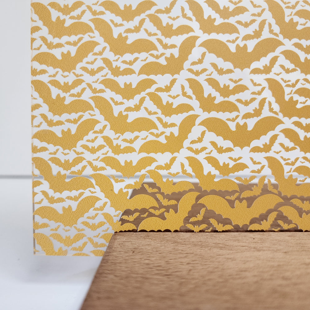 PatternPly® Scattered Light Orange Bats sheet showing the pattern