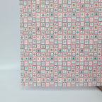 PatternPly® Full Coverage Christmas Stamps on Pink MICRO sheet showing the pattern