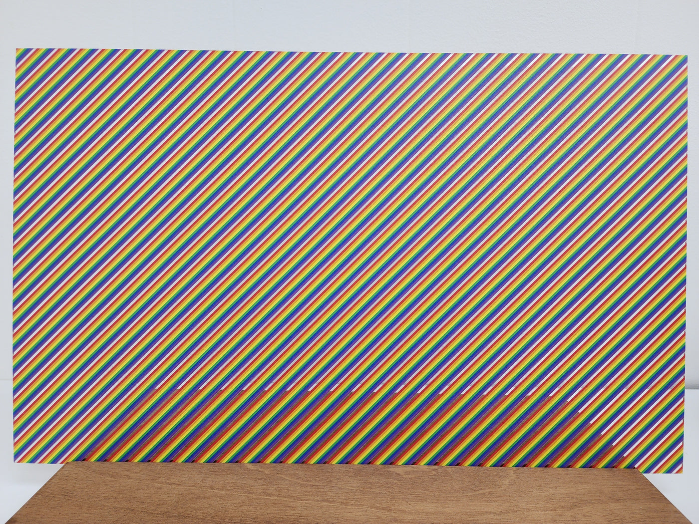 PatternPly® Scattered Mini Diagonal Rainbow Stripes