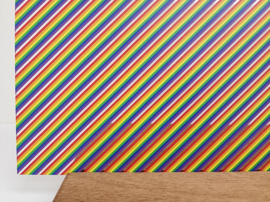 PatternPly® Scattered Mini Diagonal Rainbow Stripes sheet showing the pattern