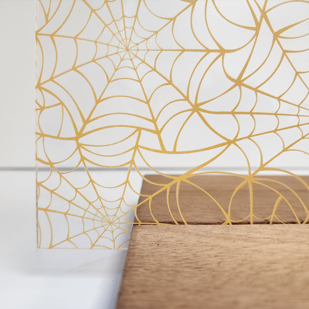 PatternPly® Scattered Light Orange Spiderwebs Large sheet showing the pattern