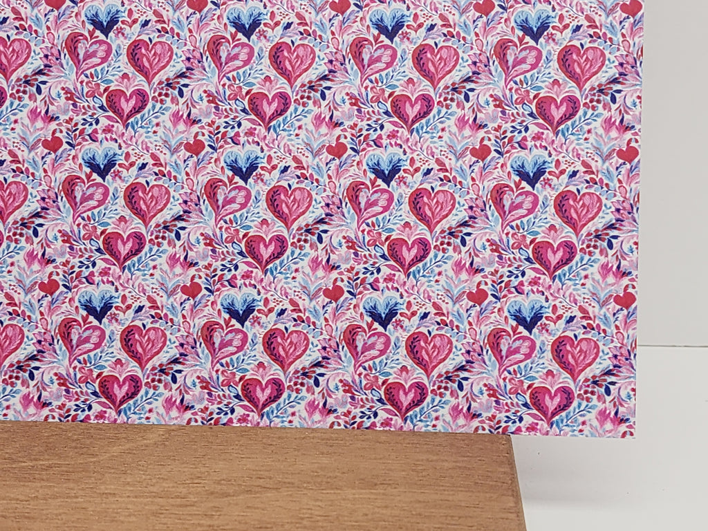 PatternPly® Full Coverage Micro Pink and Teal Hearts sheet showing the pattern