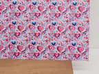 PatternPly® Full Coverage Micro Pink and Teal Hearts sheet showing the pattern