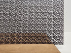 PatternPly® Scattered Micro Shamrocks BLACK sheet showing the pattern