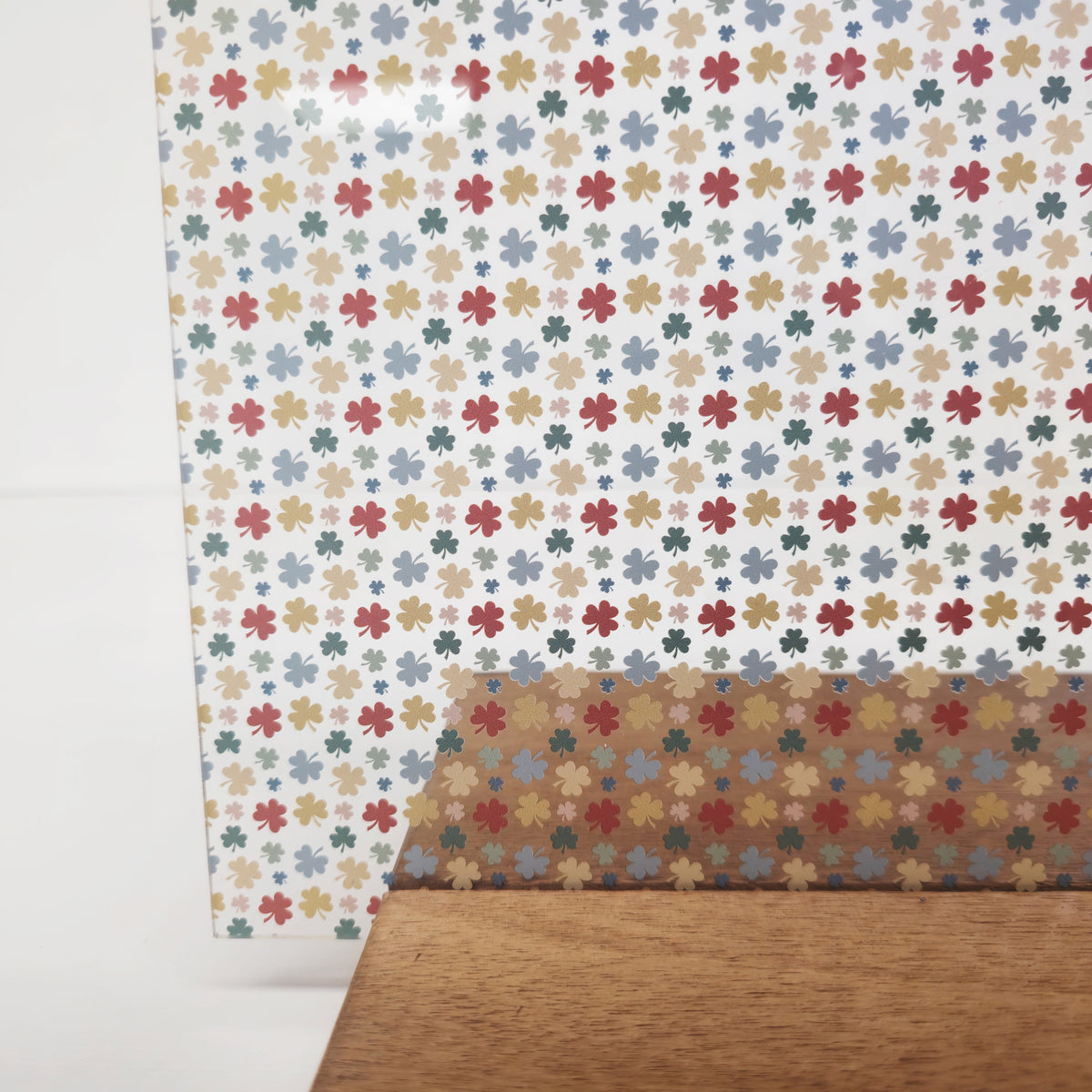 PatternPly® Scattered Neutral Shamrocks sheet showing the pattern