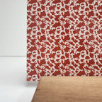 PatternPly® Full Coverage Burnt Orange Cow Spots sheet showing the pattern