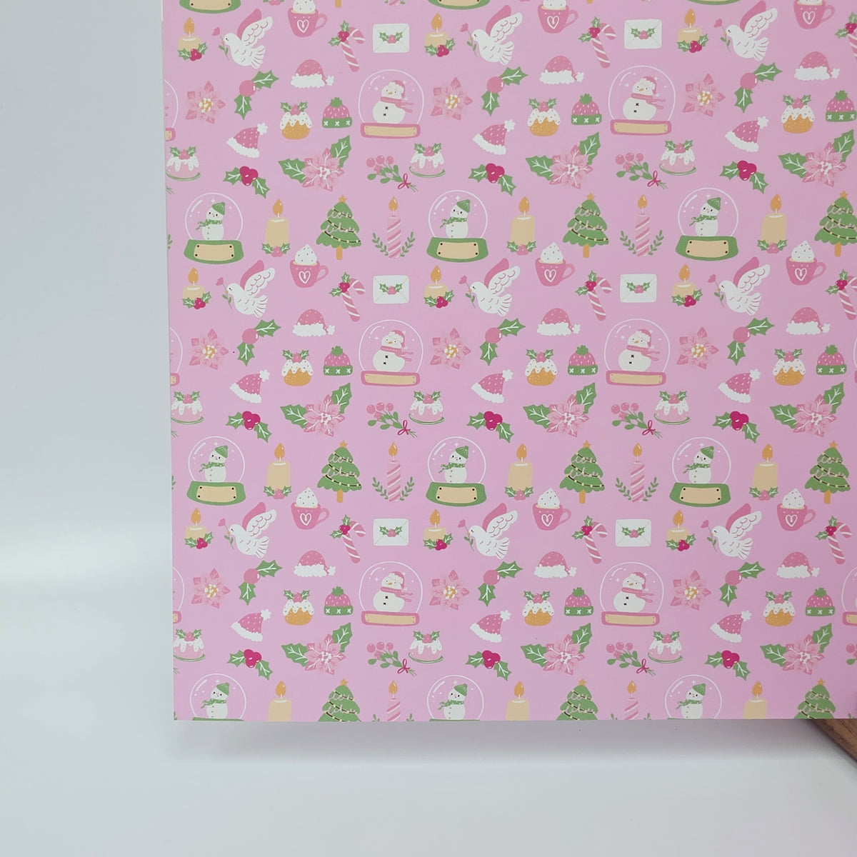 PatternPly® Full Coverage Pastel Christmas on Pink sheet showing the pattern