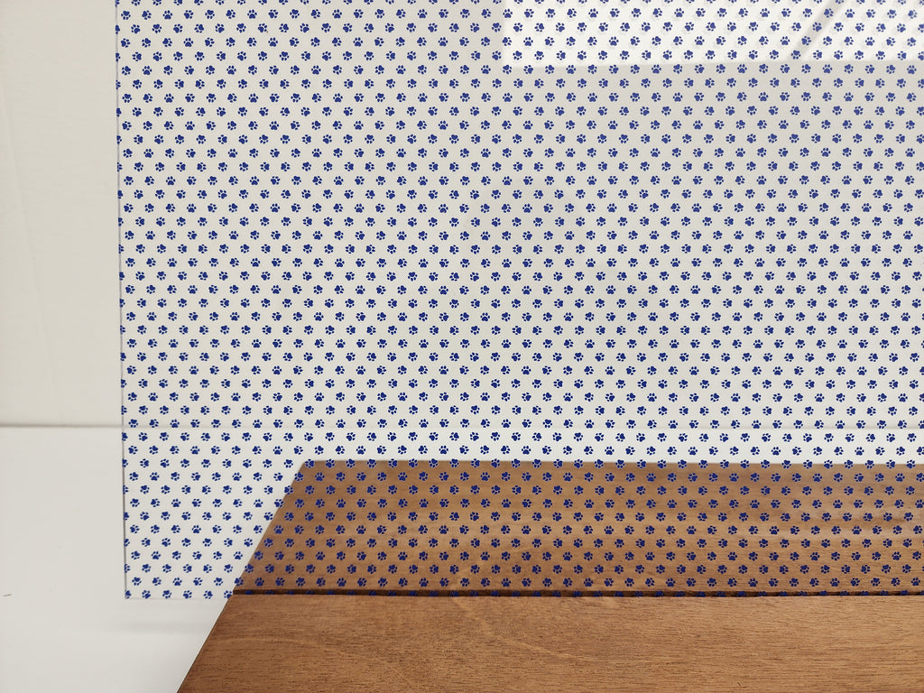 PatternPly® Scattered Micro School Pawprints BLUE sheet showing the pattern
