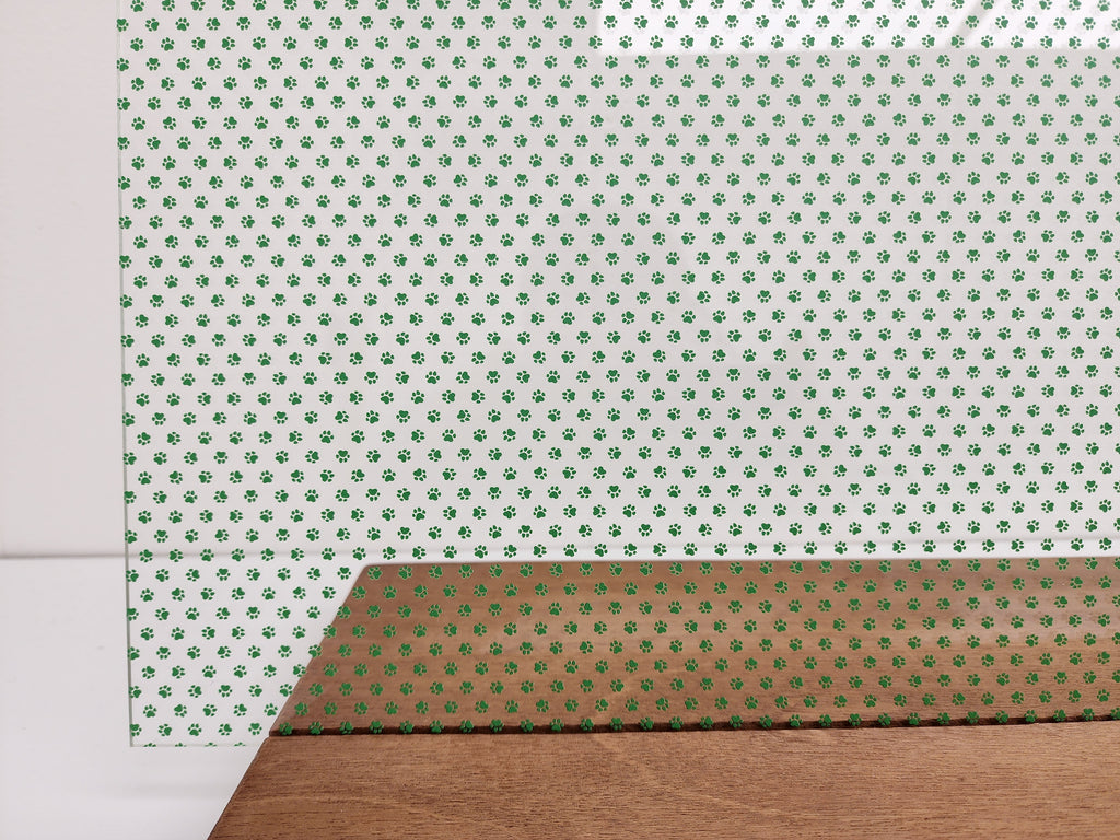 PatternPly® Scattered Micro School Pawprints GREEN sheet showing the pattern
