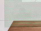 PatternPly® Scattered Micro School Pawprints GREEN sheet showing the pattern