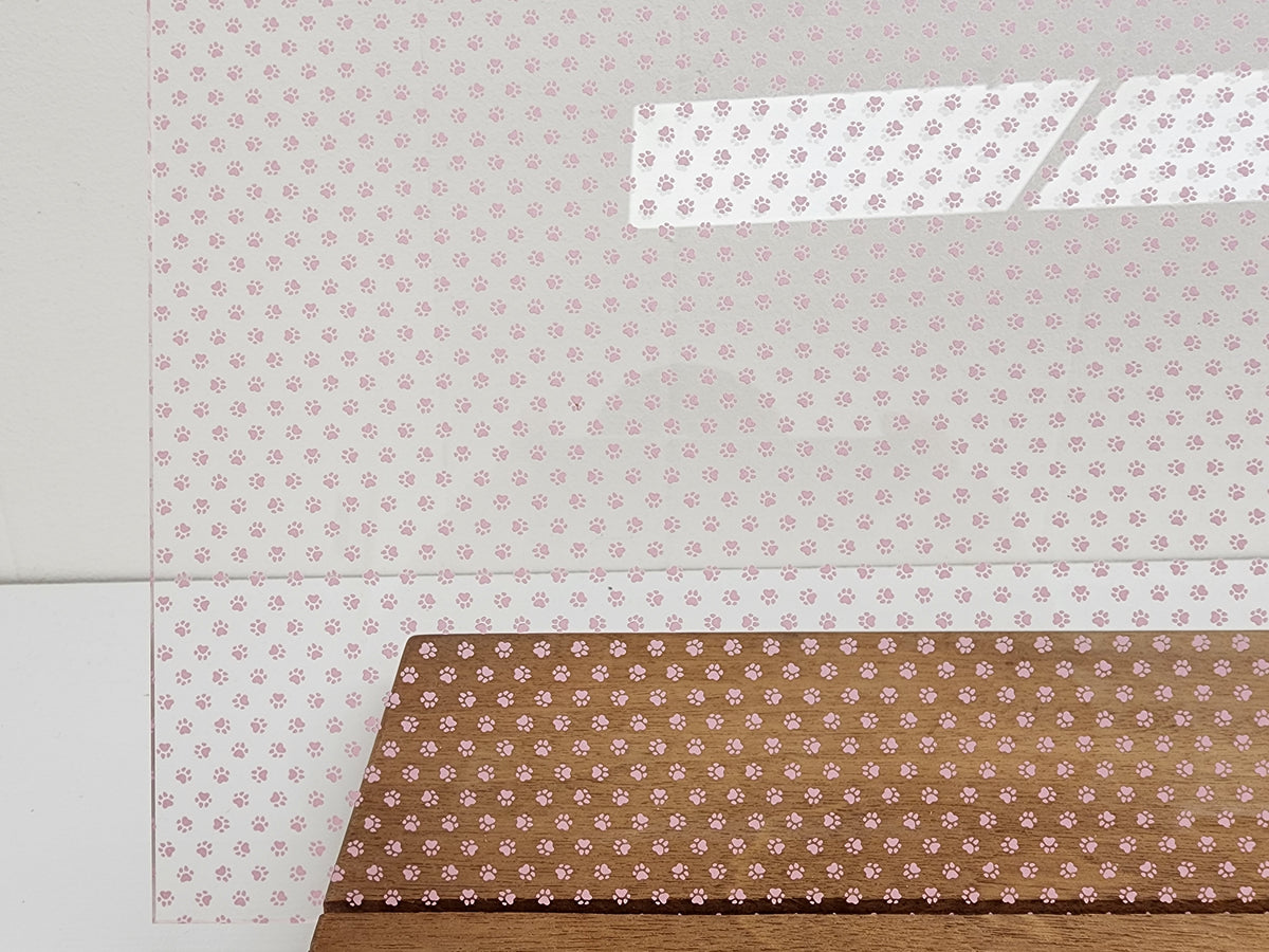 PatternPly® Scattered Micro School Pawprints LIGHT PINK sheet showing the pattern