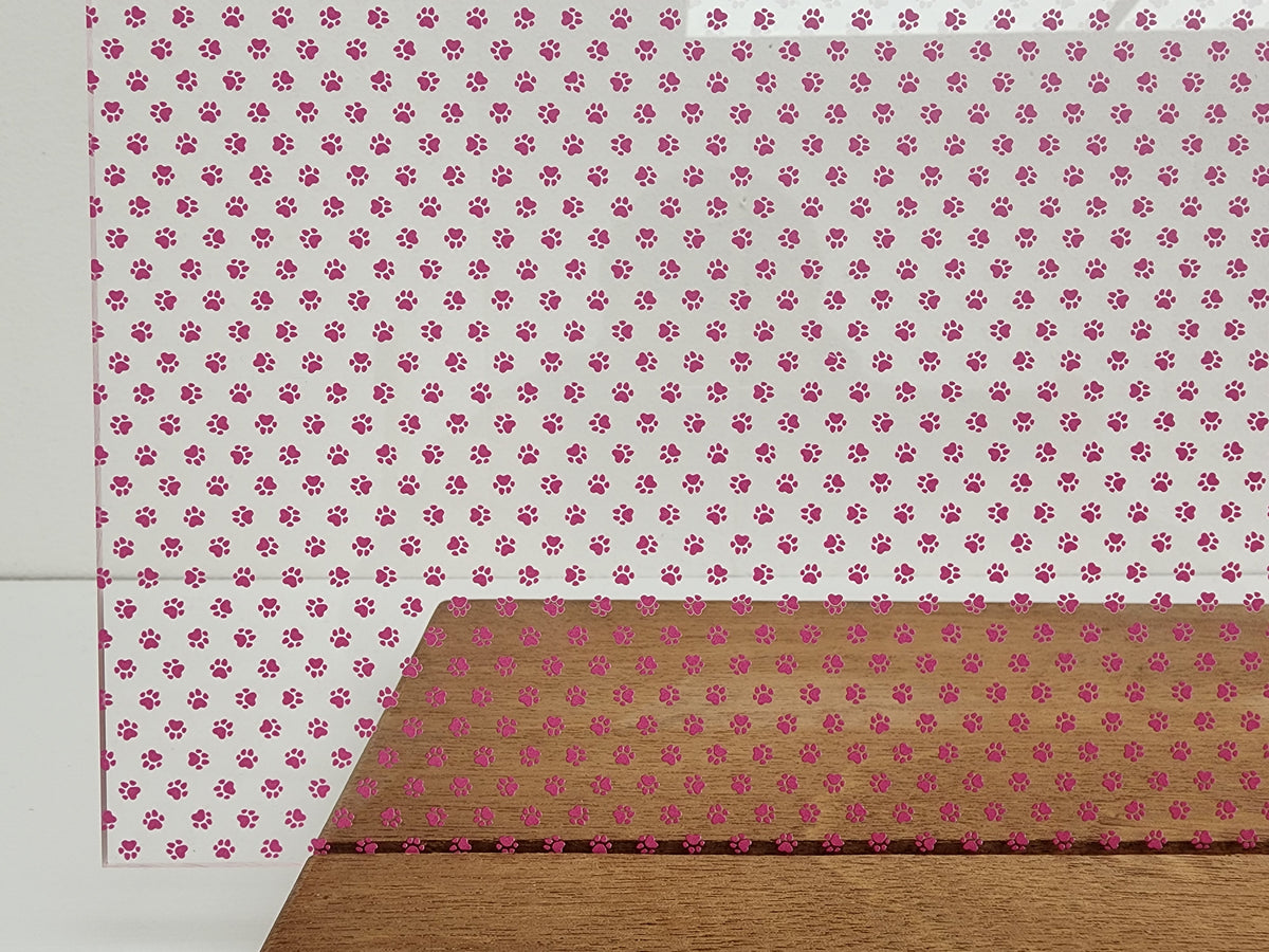 PatternPly® Scattered Micro School Pawprints PINK sheet showing the pattern