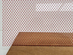PatternPly® Scattered Micro School Pawprints RED sheet showing the pattern