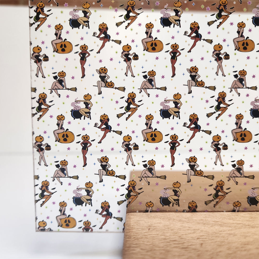 PatternPly® Scattered Pumpkin Head Pinups sheet showing the pattern