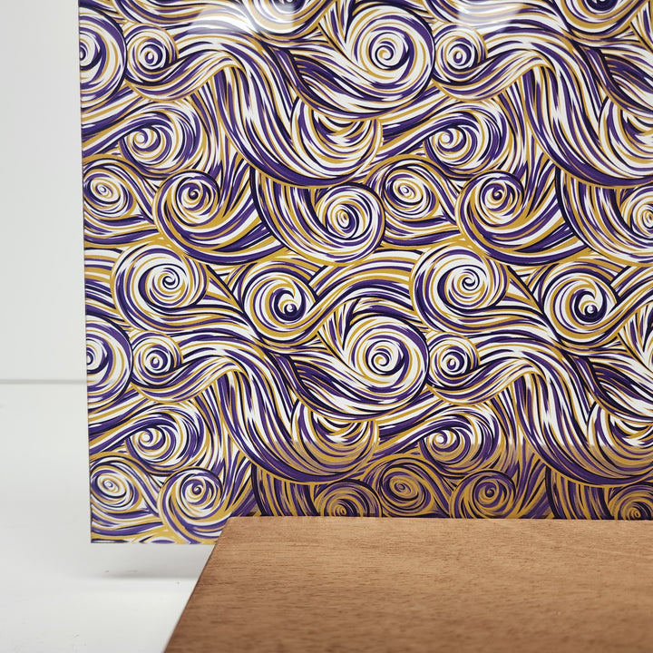 PatternPly® Scattered Purple and Gold Swirls