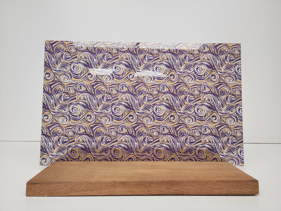 PatternPly® Scattered Purple and Gold Swirls