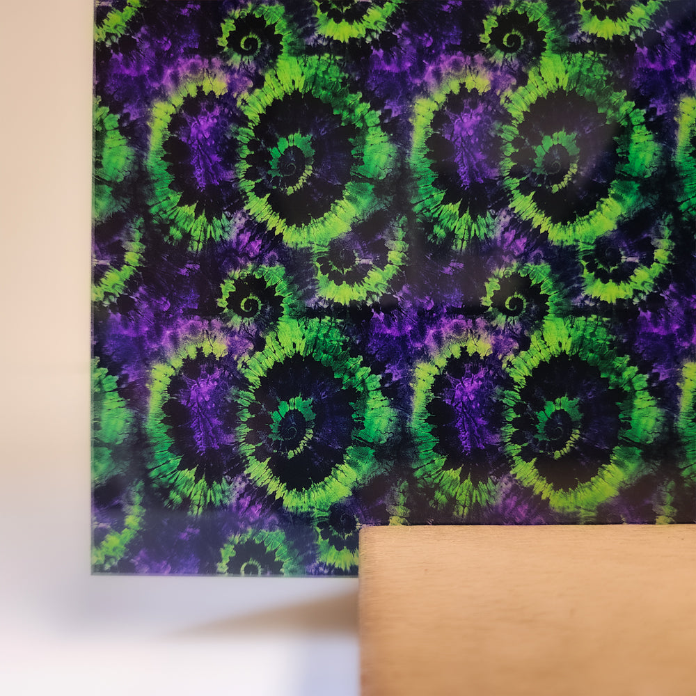 PatternPly® Full Coverage Green and Purple Halloween Tie Dye sheet showing the pattern