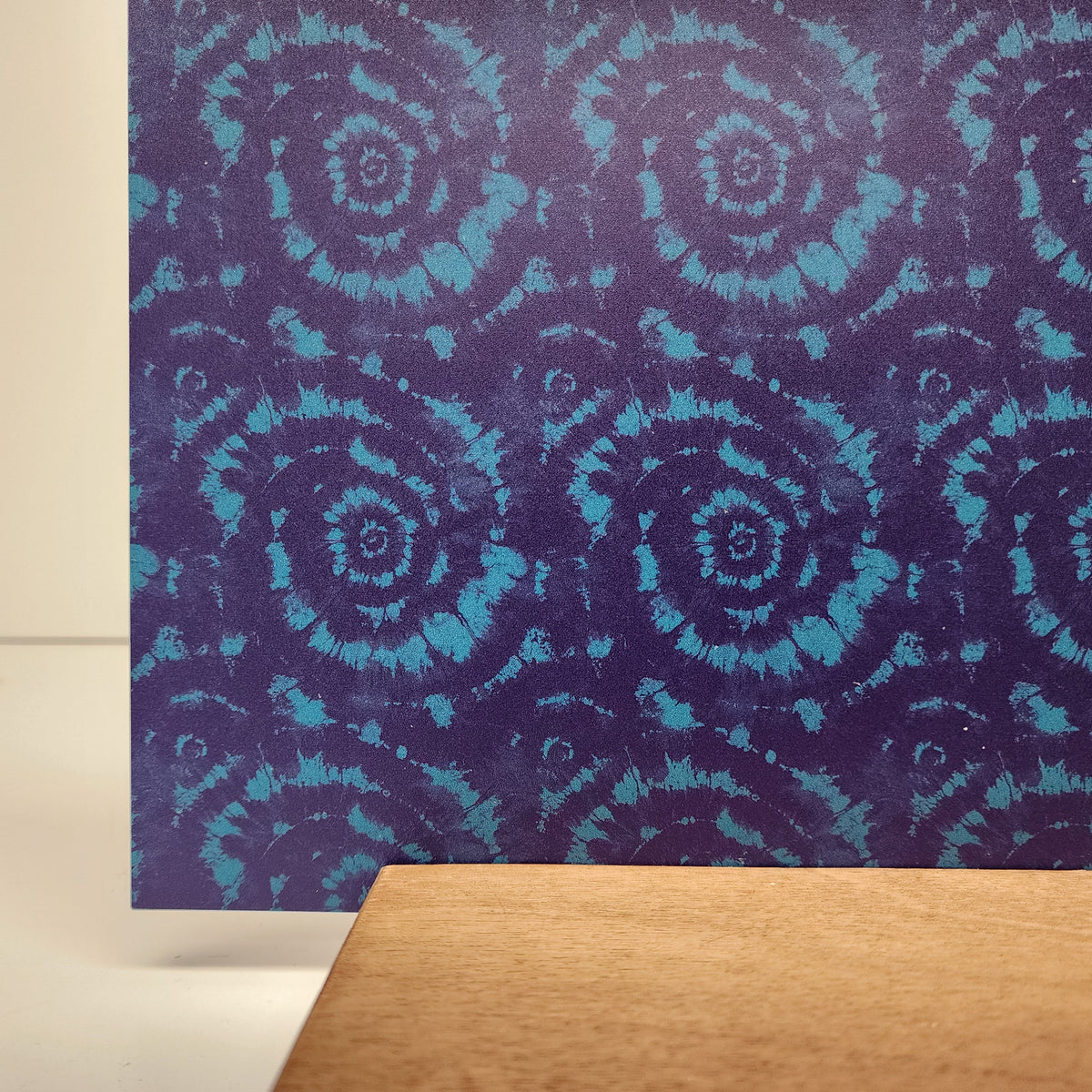 PatternPly® Full Coverage Purple and Teal Tie Dye sheet showing the pattern