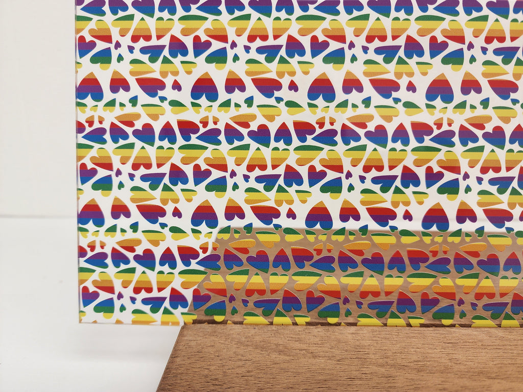 PatternPly® Scattered Rainbow Striped Hearts sheet showing the pattern
