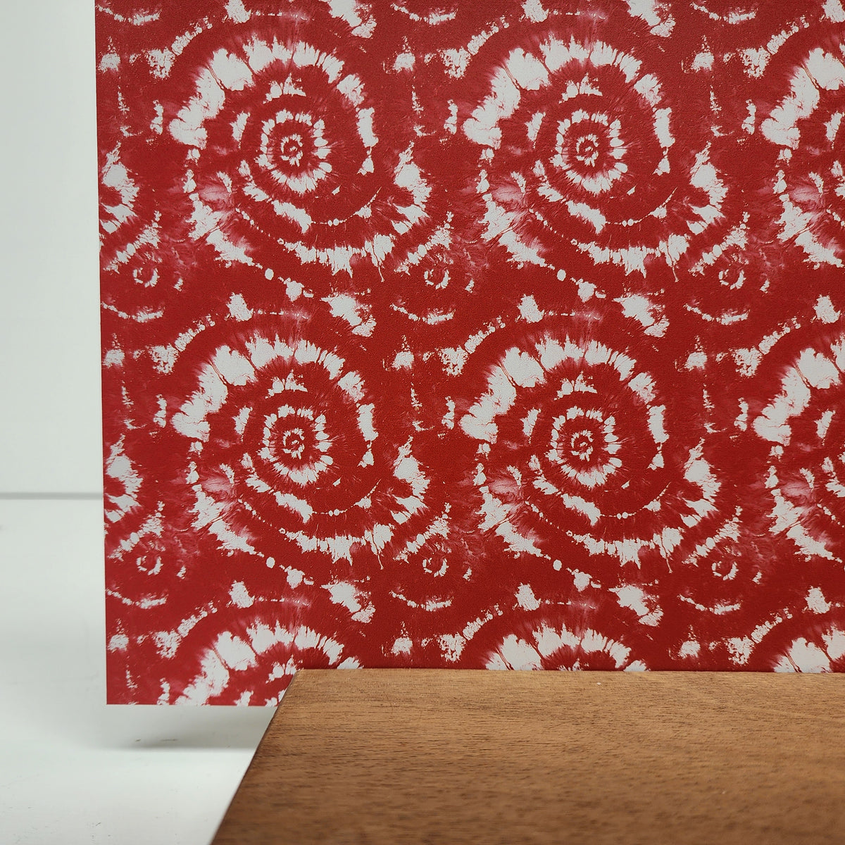 PatternPly® Full Coverage Red and White Tie Dye sheet showing the pattern