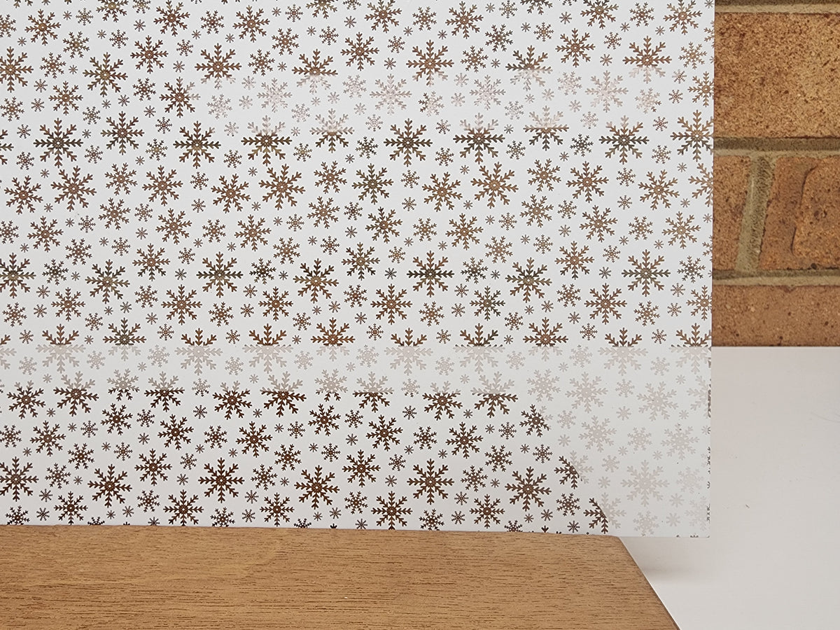 PatternPly® Scattered Snowflakes WHITE sheet showing the pattern