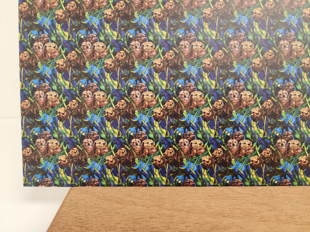 PatternPly® Full Coverage Stained Glass Sea Otters sheet showing the pattern